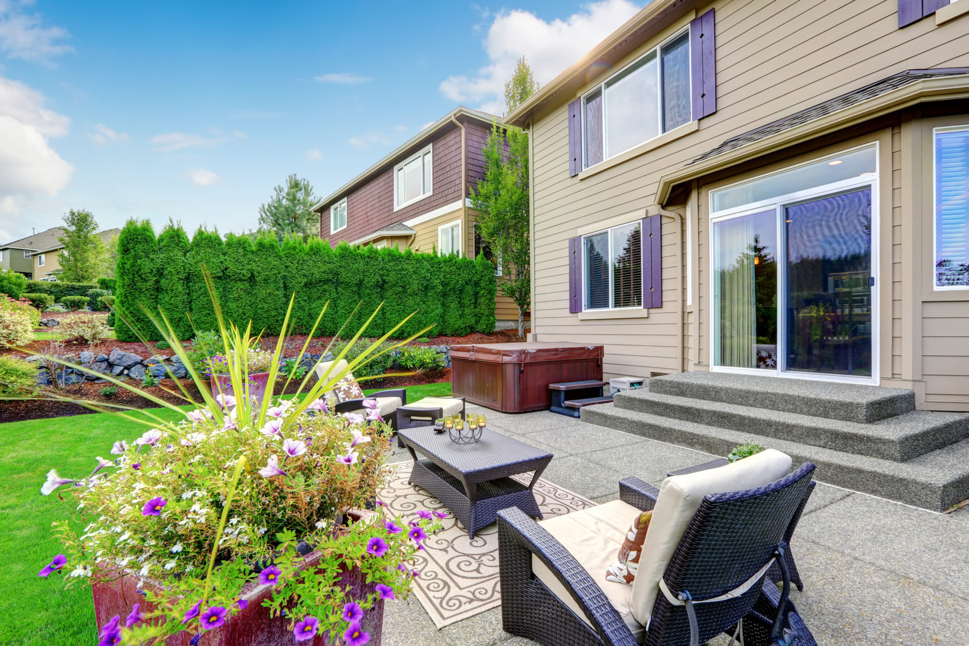 Cozy,Patio,Area,With,Settees,And,Table,,Decorated,With,Flower Cozy,Patio,Area,With,Settees,And,Table,,Decorated,With,Flower